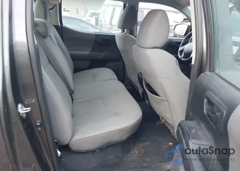 2018 Toyota Tacoma Sr V6 z USA, uszkodzony, nr VIN 3TMCZ5ANXJM124253